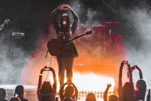Lead Singer of Cruel Summer on stage